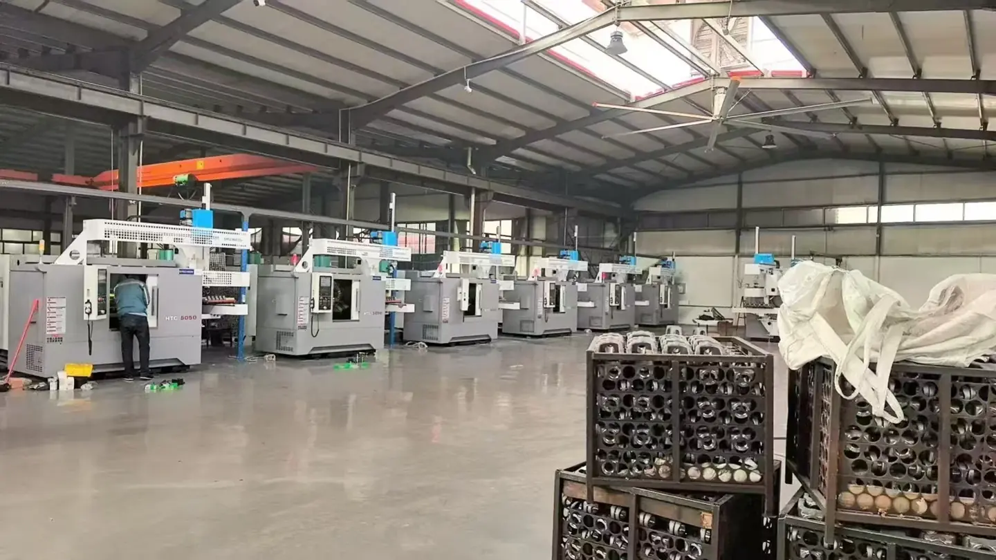 Row of HTC5050 turning machines with overhead handling equipment